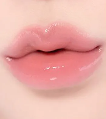Coralhaze Volumizing Lip Fondue – сяючий бальзам для об'єму губ 01 Naïve