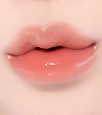 Coralhaze Volumizing Lip Fondue – сяючий бальзам для об'єму губ 02 Lenient