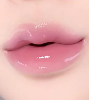 Coralhaze Volumizing Lip Fondue – сяючий бальзам для об'єму губ 09 Outrun