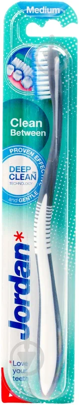 Зубна щітка Jordan Clean between середня для чутливих зубів і ясен