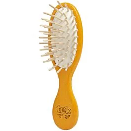 Little oval purse brush