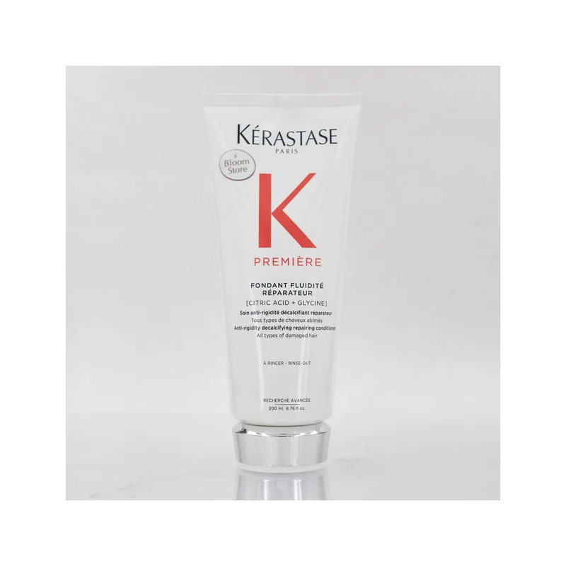 Premiere Fondant Fluidite Reparateur - Декальцинуючий кондиціонер для пом'якшення та відновлення всіх типів пошкодженого волосся